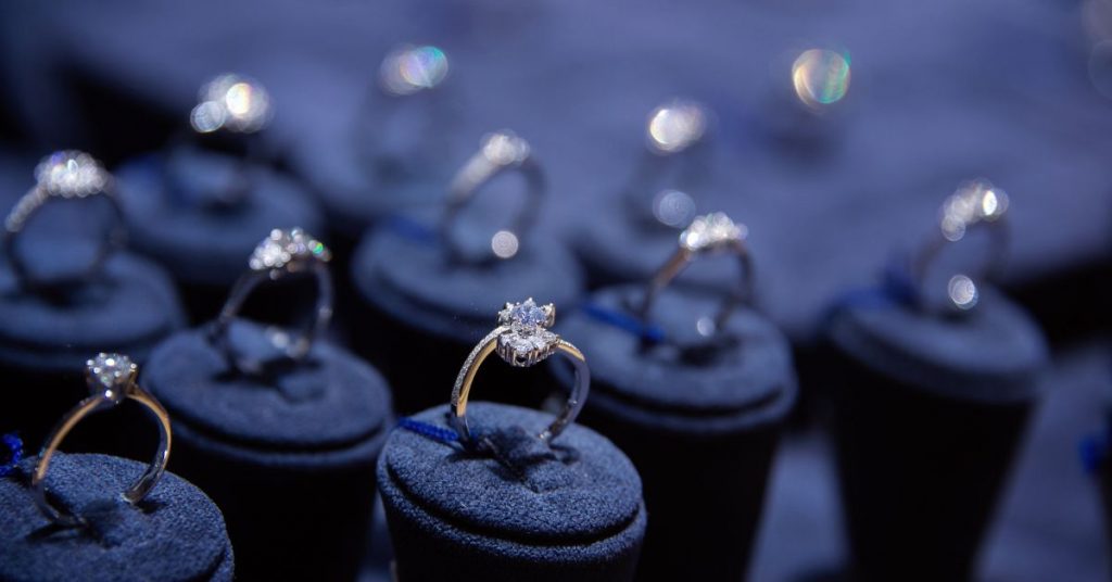 Fine luxury diamond jewellery window display with ring pedant