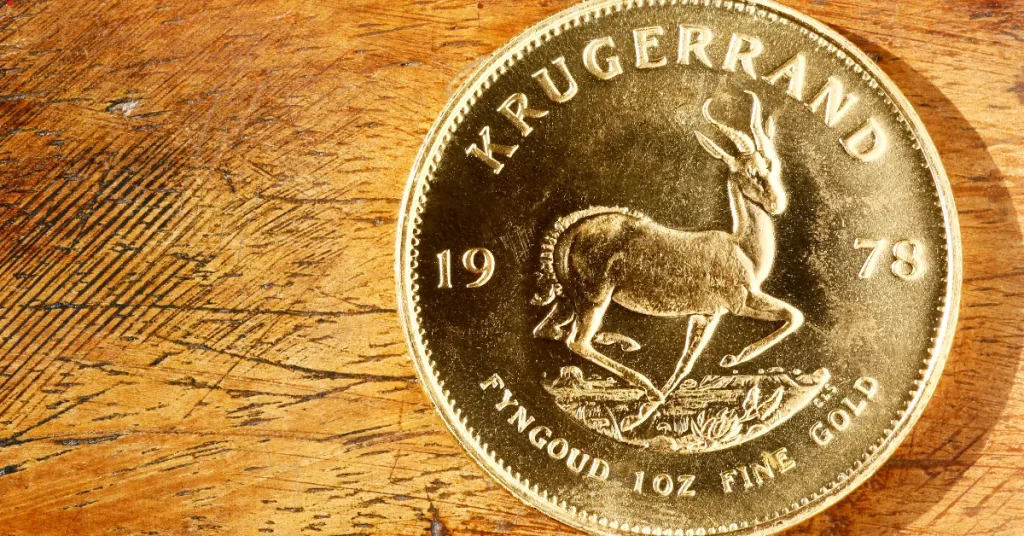Factors That Shape The Price Of A Krugerrand Gold Krugerrand on a table