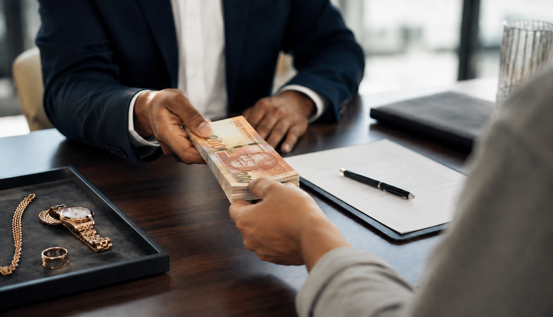 stock photo close up of businessman hand giving money russian banknotes to his partner on the table loan ()